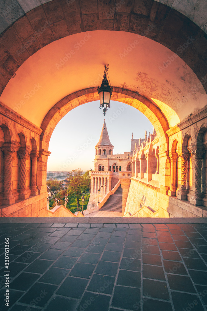 the fishermen's bastion in the morning in budapest, teaching people and in a dreamlike light