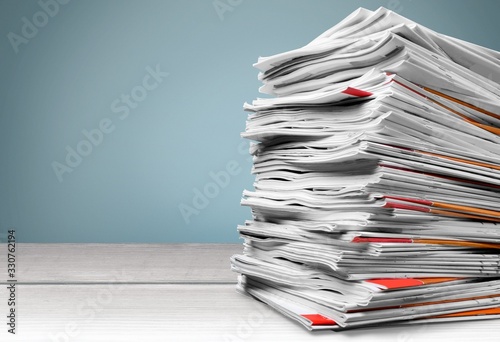 Tableau sur toile Stack file folders with documents on the desk