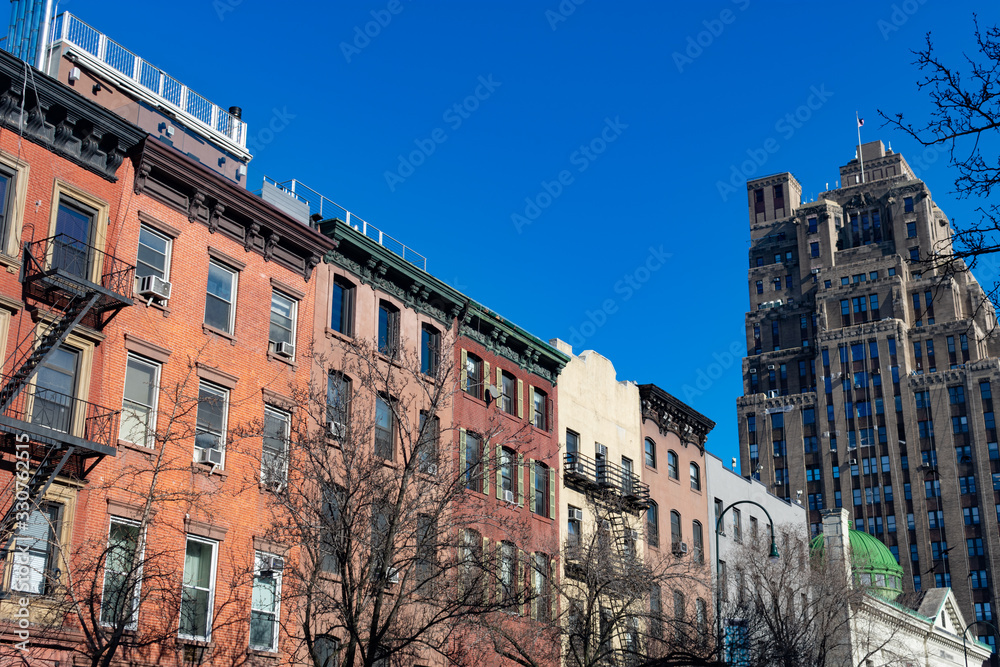 Row of Colorful Old Brick Residential Buildings in Chelsea of New York City