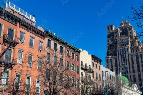 Row of Colorful Old Brick Residential Buildings in Chelsea of New York City © James