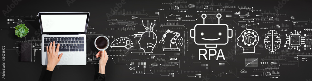 Robotic process automation concept with person using a laptop computer Robotic process automation concept with person using a laptop computer