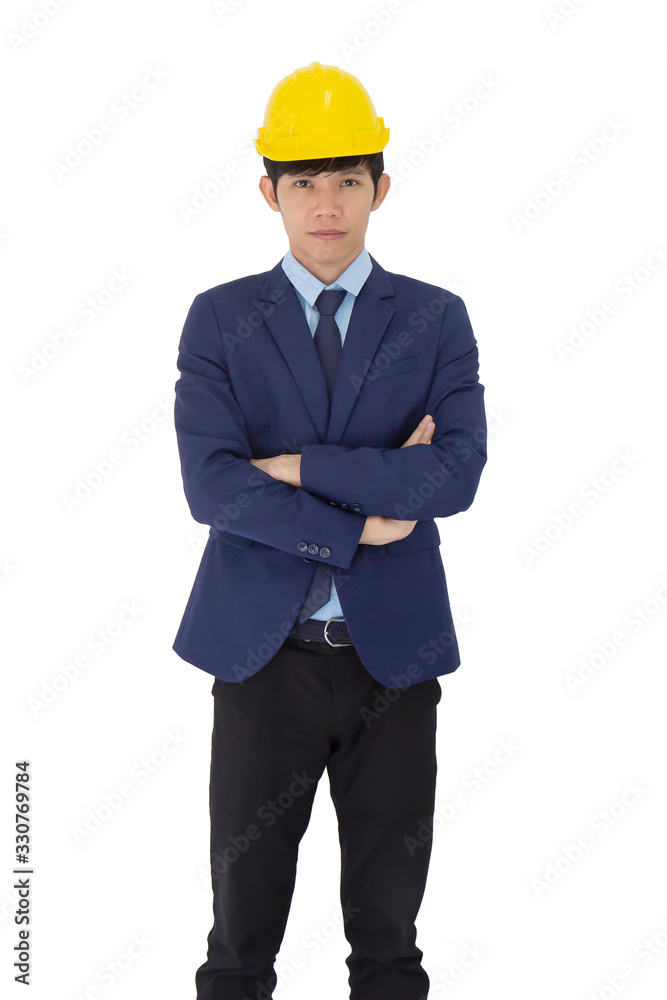 A young Asian foreman wears a yellow helmet isolated on white background. A young Asian foreman wears a yellow helmet isolated on white background.