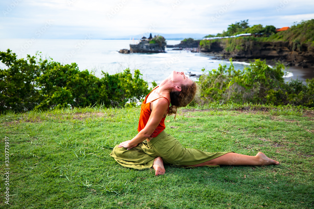 Outdoor Yoga Practice Young Woman Practicing Ardha Kapotasana Half outdoor-yoga-practice-young-woman-practicing-ardha-kapotasana-half