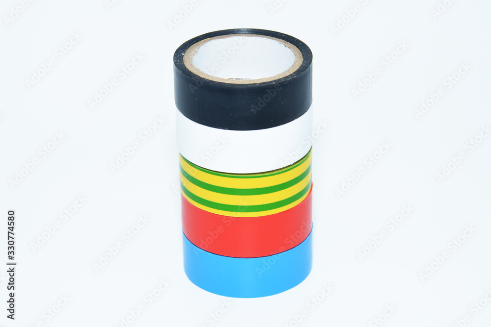 Photo of multicolored insulating tapes against the white background