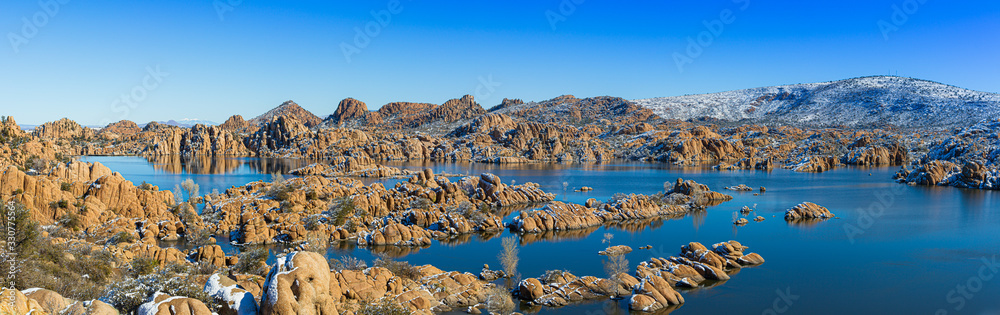 A panoramic winter image of Watson Lake in Prescott Arizona with the Granite Dells taken by a drone.