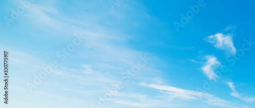 white and blue sky in summertime photo