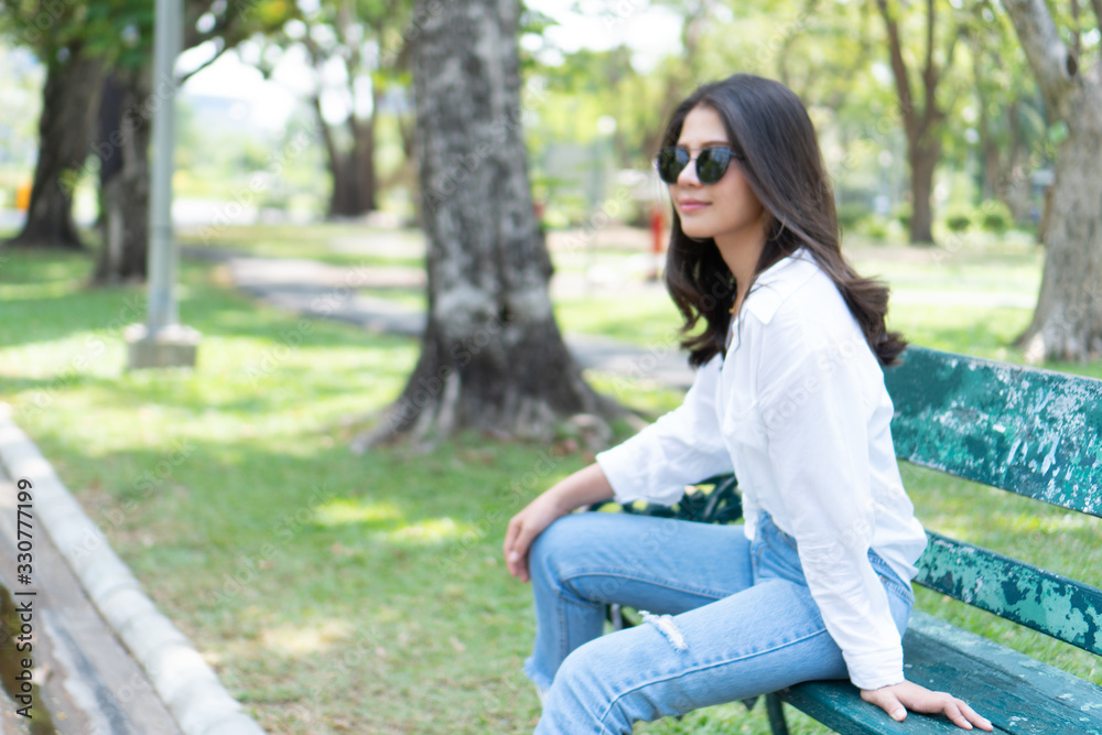 Beautiful Asian women with long hair wearing a white shirt. White bug hat, jeans showing emotions In the nature park-09.jpg, Asian beautiful woman with yellow skin, long black hair, wearing a white s Beautiful Asian women with long hair wearing a white shirt. White bug hat, jeans showing emotions In the nature park-09.jpg, Asian beautiful woman with yellow skin, long black hair, wearing a white s