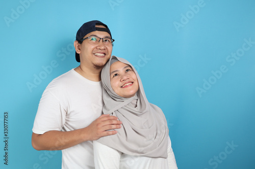Happy Asian Muslim Couple Dreaming