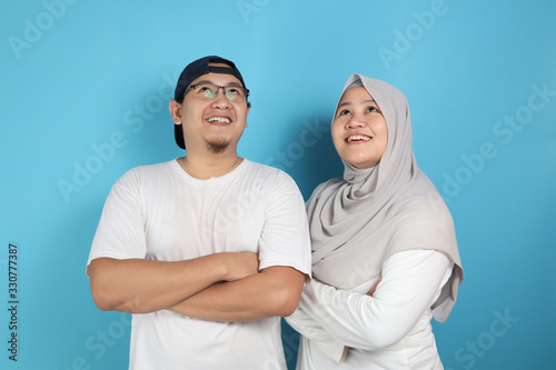 Happy Asian Muslim Couple Dreaming