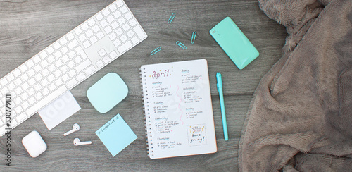 Flat layout of work place. Cozy blanket and a schedule