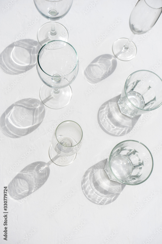 Set of wine and drinking glasses on white background Set of wine and drinking glasses on white background