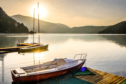 sailboat at a lake photo