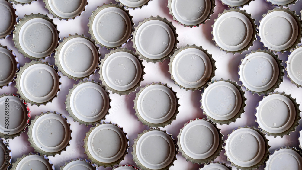 pile of bottle caps white background. beer caps pile of bottle caps white background. beer caps