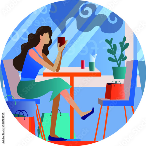 young woman in a cafe with a mug in her hands