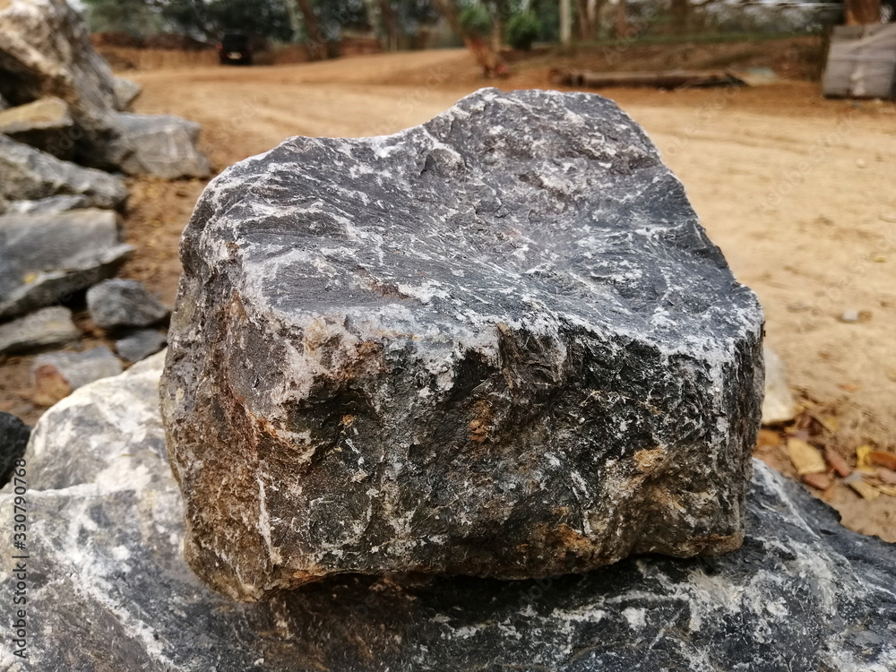 Limestone rock on nature background. Limestone is a sedimentary rock composed mostly of the mineral calcite, It is a basic building block of the construction industry. Limestone rock on nature background. Limestone is a sedimentary rock composed mostly of the mineral calcite, It is a basic building block of the construction industry.