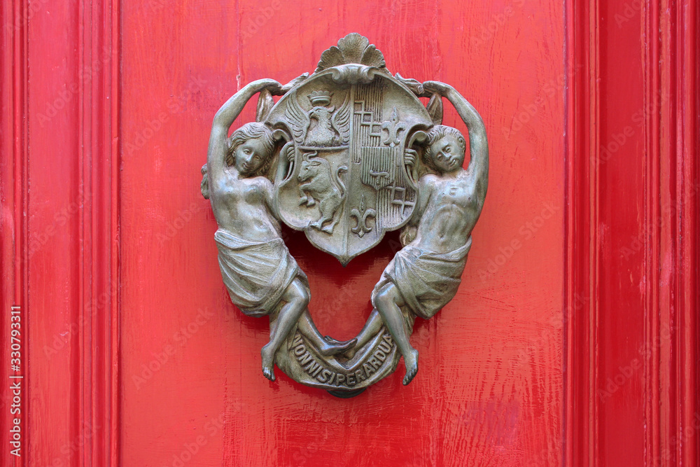 sculpted decor on a door in mdina (malta) sculpted decor on a door in mdina (malta)