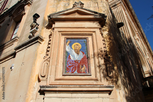religious decor on a facade in mdina (malta)