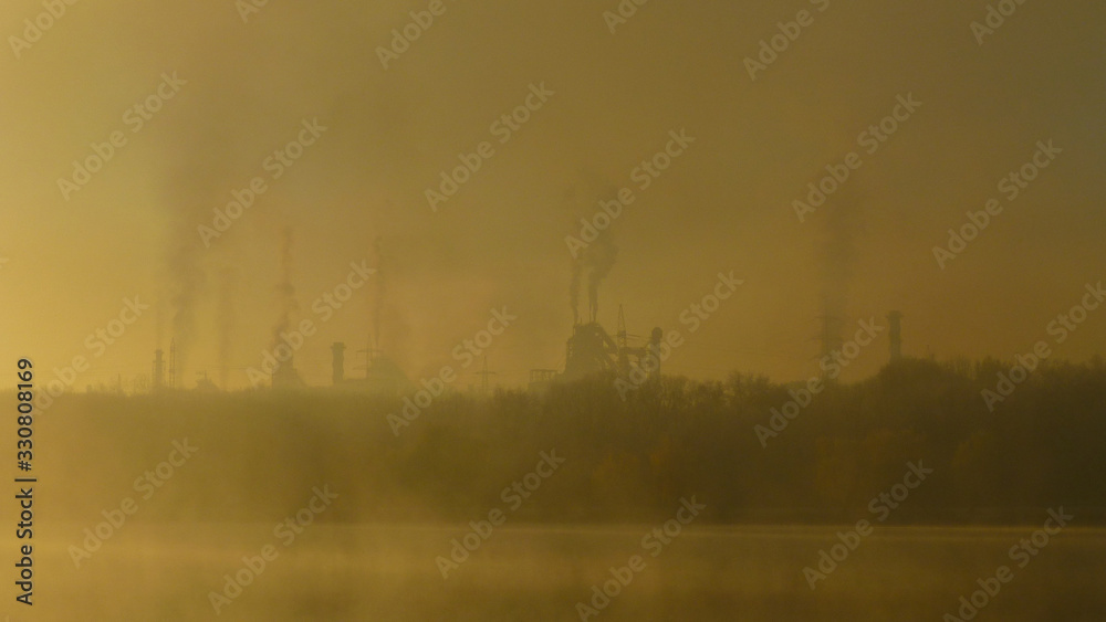 Pollution of nature concept. Metallurgical factory background.