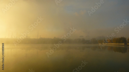 Industrial factory at dawn. Metallurgical factory background. © dimdiz