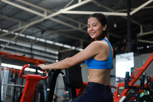 Asian woman in fitness gym