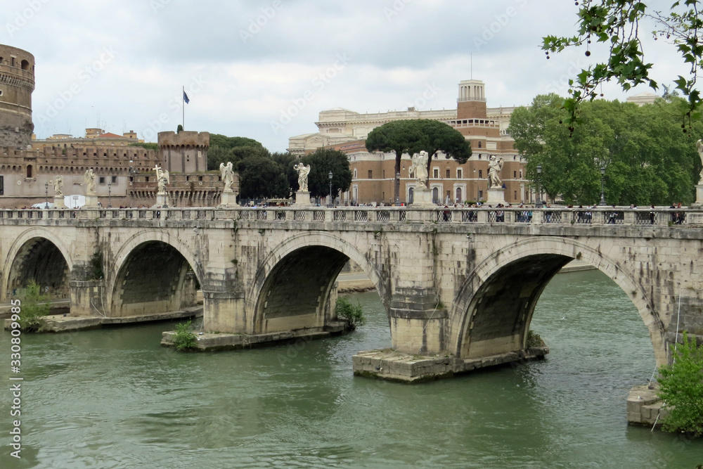 View of the bridge leading to the Castle of the Holy Angel (Castel Sant'Angelo); Rome, Italy, Europe