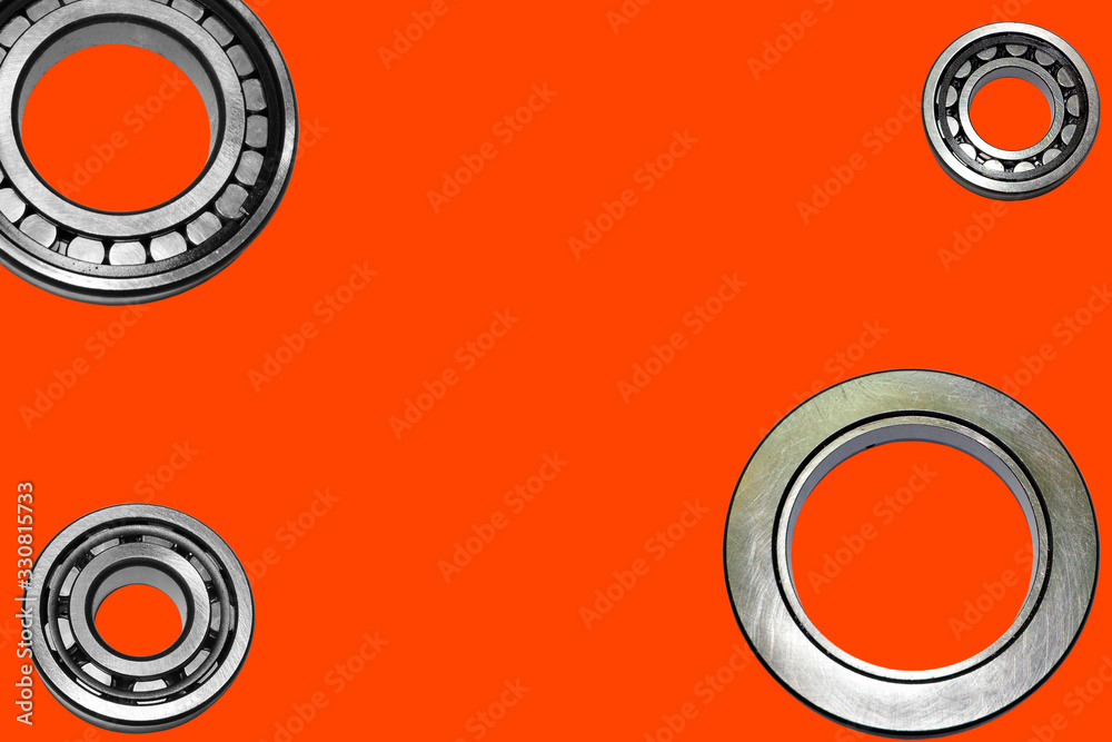 Car bearings collage on isolated Lush Lava background. Bearings close-up advertising store. Banner on the website. Car bearings collage on isolated Lush Lava background. Bearings close-up advertising store. Banner on the website.