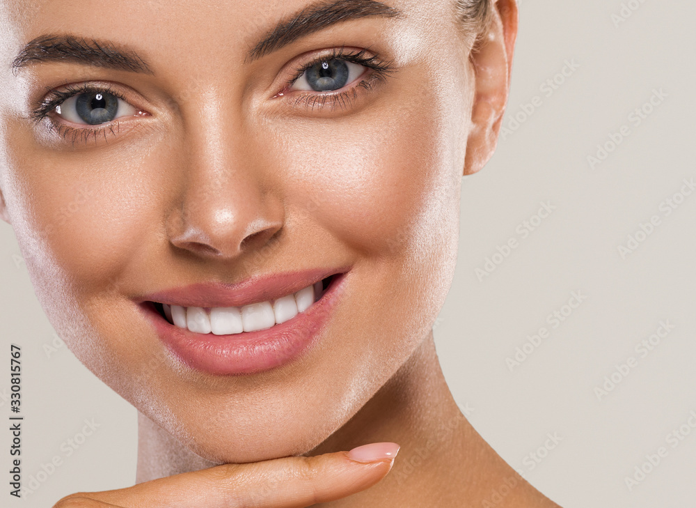 Beautiful healthy teeth smile woman face clean skin natural make up female beauty Beautiful healthy teeth smile woman face clean skin natural make up female beauty