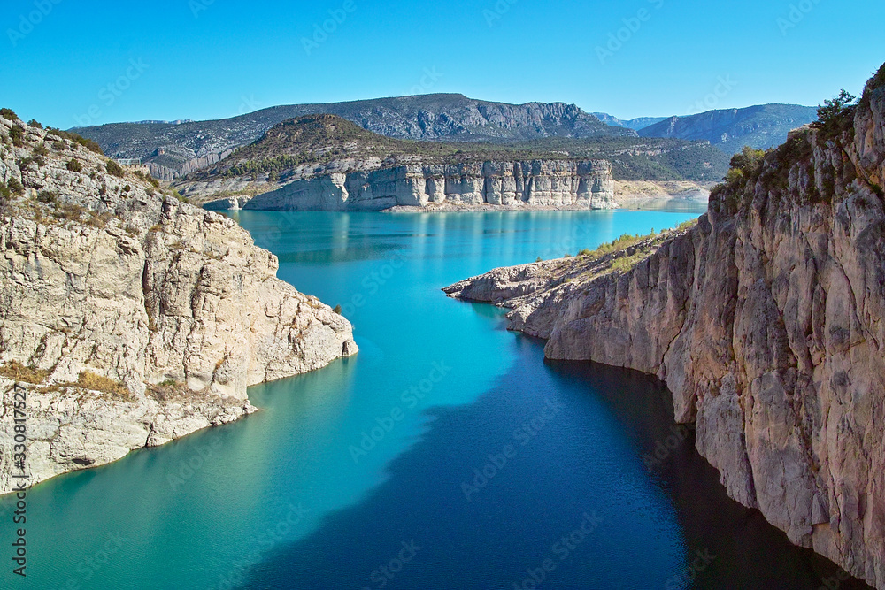 breathtaking blue spanish lake in the summer sun