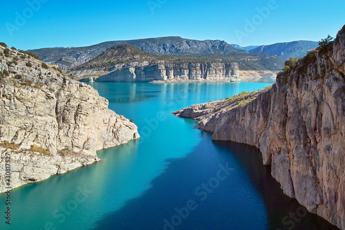 breathtaking blue spanish lake in the summer sun