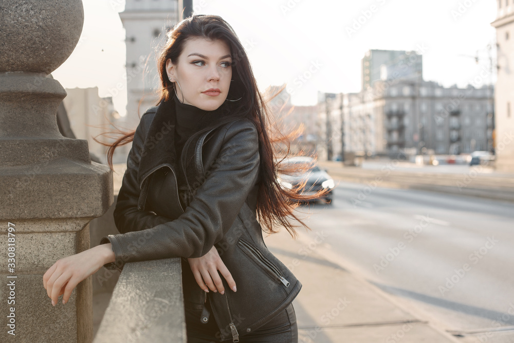 Young woman in the city. Stylish girl in Europe. City trip.