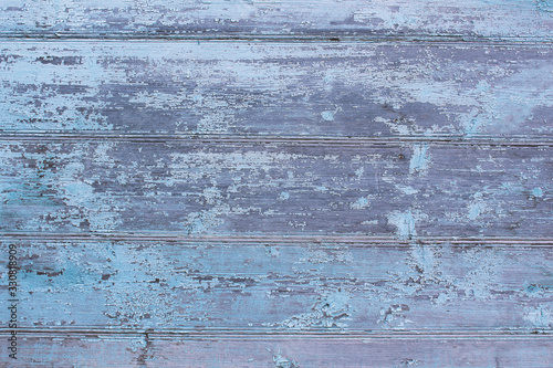 Old wooden boards painted blue. Close-up. Background. Texture.