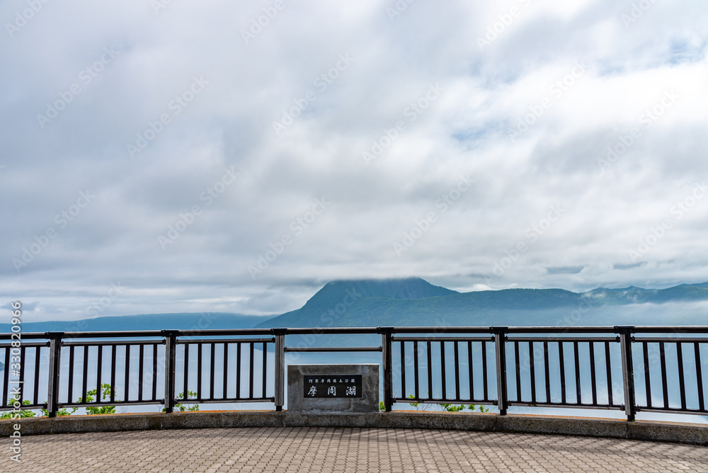 Lake Mashu viewing platform. The Lake surface often obscured by fog in summer season, given the lake a reputation for mysteriousness. Hokkaido, Japan. Translation : Lake Mashu, Akan National Park