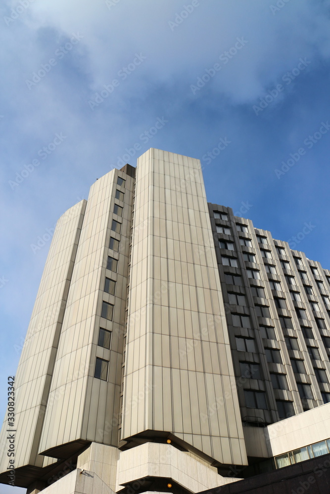 Corner of a tall building, acute angle view Corner of a tall building, acute angle view