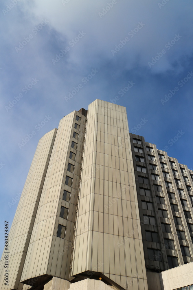Corner of a tall building, acute angle view Corner of a tall building, acute angle view