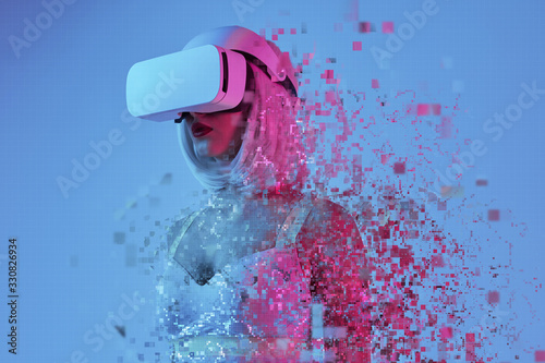 Photos Futuristic woman immersing into virtual reality
