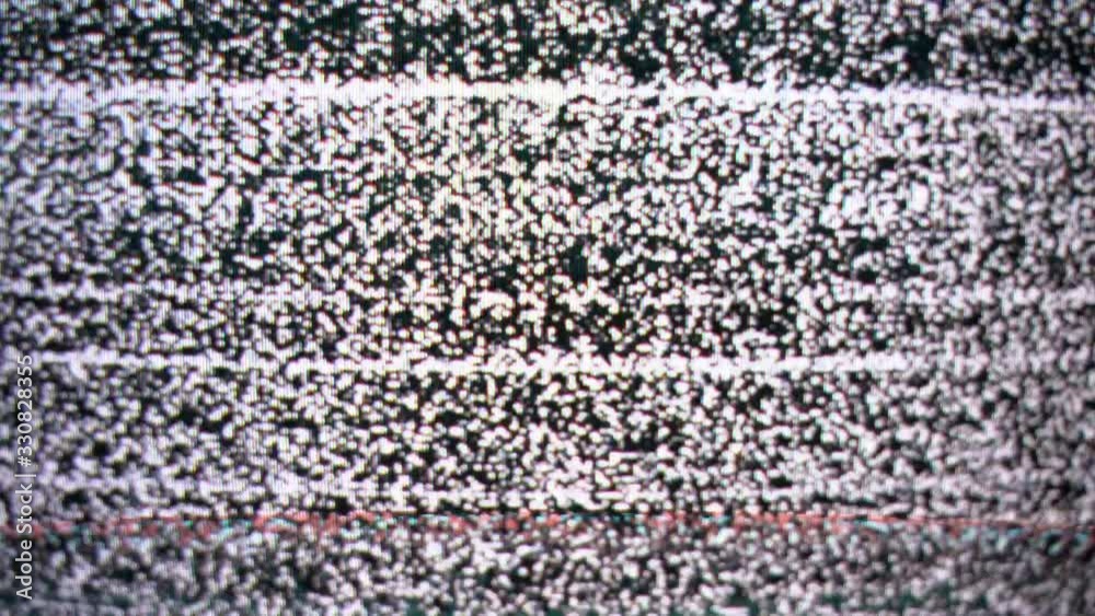 Stockvideo Retro TV screen flickers on and off, grain screen effect