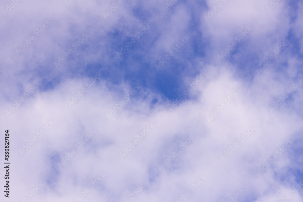 Blurry white clouds against the blue sky. Blurry white clouds against the blue sky.