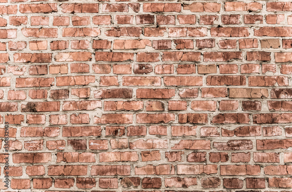 Fototapeta premium Old cracked red brick wall