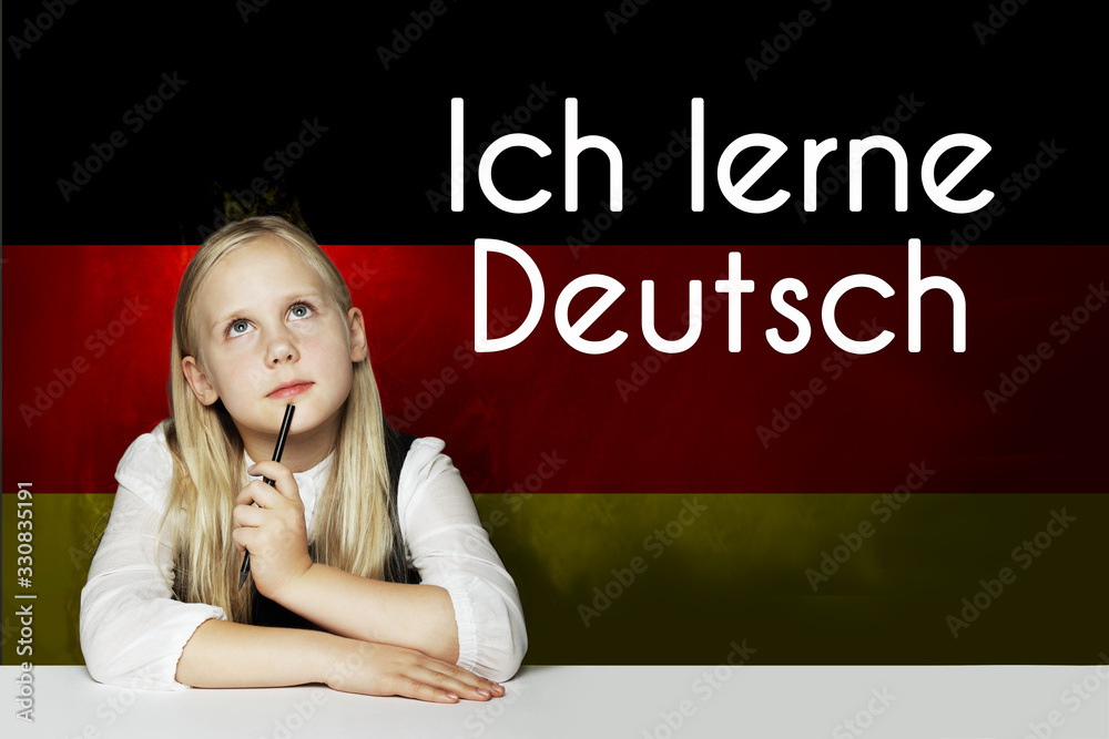 Fototapeta premium Thinking child girl student against the Germany flag background. Deutsch concept with inscription learn Deutsch on Deutsch language