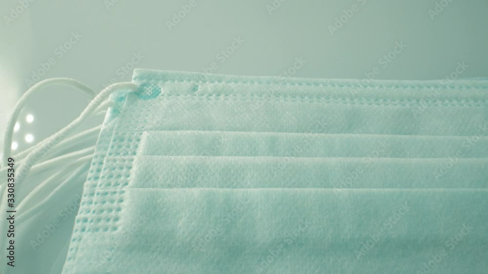 Medical mask for protection against flu and other diseases coronavirus. Surgical protective mask. Medical respiratory bandage face. prevention of the spread of virus and epidemic Covid-19.copy space Medical mask for protection against flu and other diseases coronavirus. Surgical protective mask. Medical respiratory bandage face. prevention of the spread of virus and epidemic Covid-19.copy space