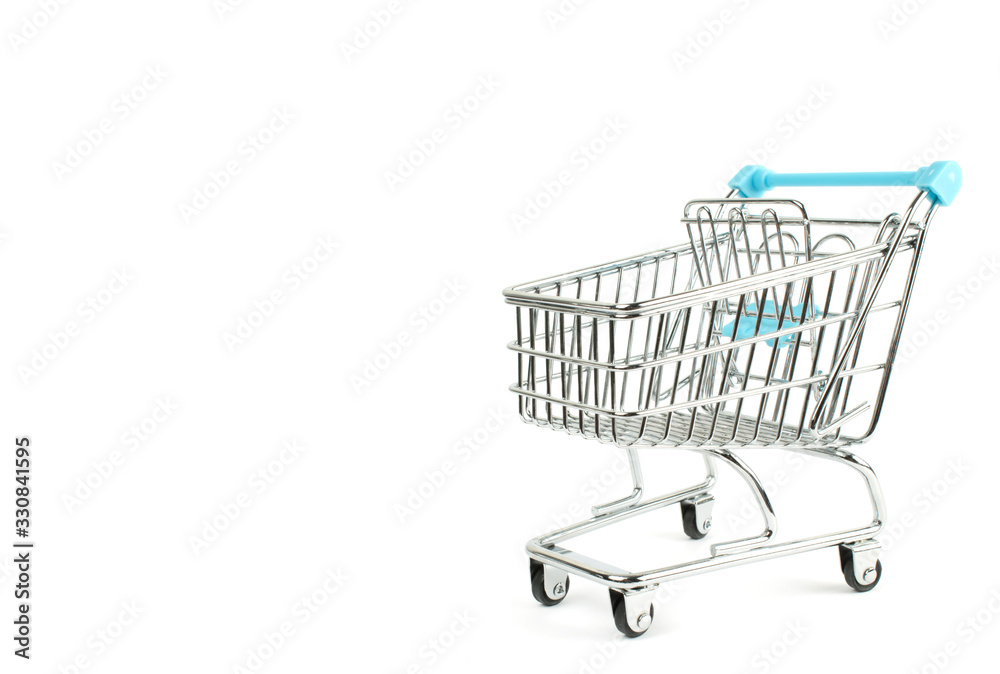 The cart of a supermarket on the white isolate. The cart of a supermarket on the white isolate.