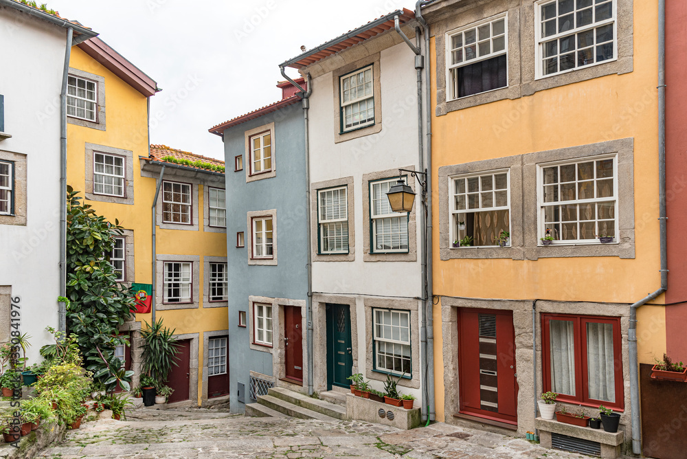 Colorful buildings in the city of Porto in Portugal Picturesque buildings among an alley 