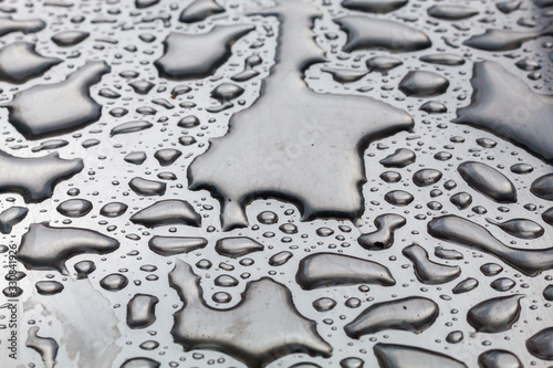 Close Up Water Drops on Gray Background © bojanzivkovic
