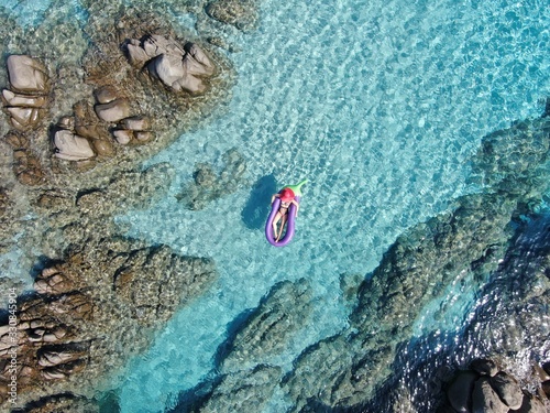 Red hat girl on the water