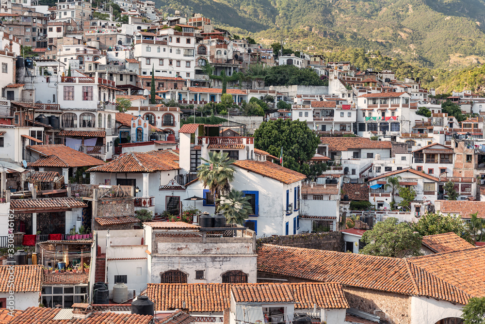 Scenic view of Taxco, Mexico. Overview of dense buildings on steep hills of colonial town of Taxco