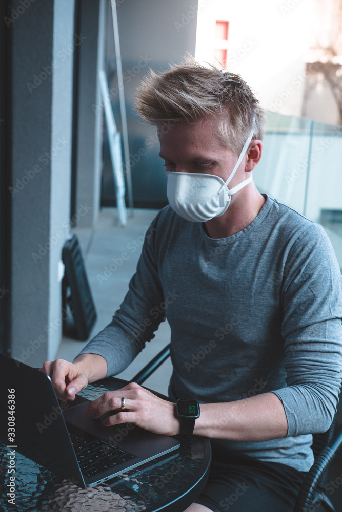 Man wearing FFP3 face mask respirator against flu Man wearing FFP3 face mask respirator against flu