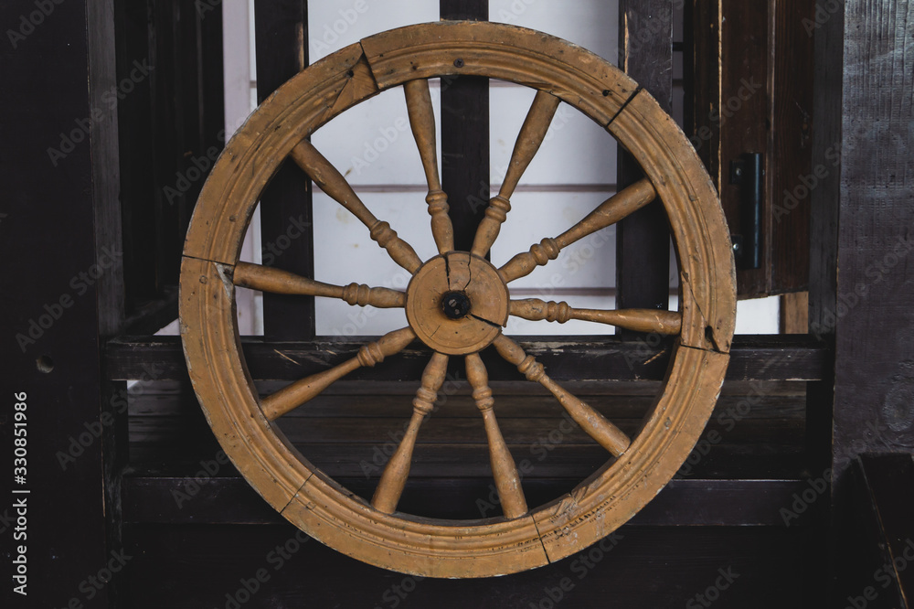 Old wooden wheel of wagon. wheel of antique carriage