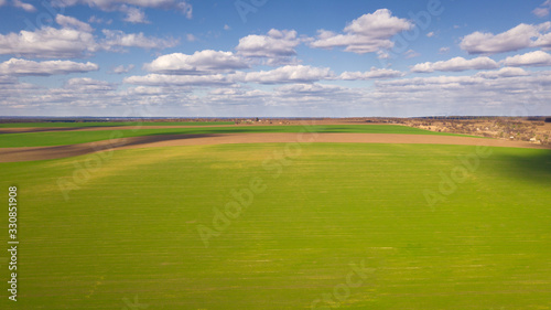 Birds eye view of Ukrainian spring landscape. Natural background on a sunny day. Photo of the countryside.