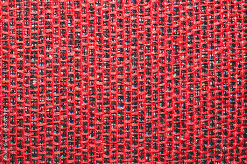 Red fabric texture. textile background extremely close up. woven pattern