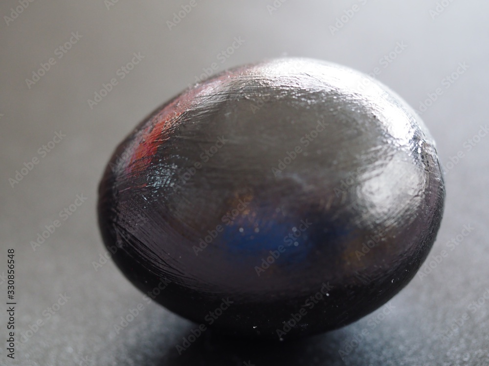 Minimalism Black Egg on Black Background with Light Reflections in Egg Minimalism Black Egg on Black Background with Light Reflections in Egg
